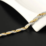 Pulsera Biomagnetica terapéutica de Acero de Titanio Plateada / Bañada en Oro de 18K (2X1)